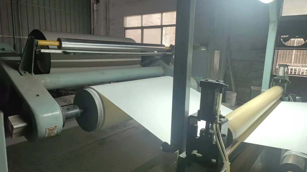 PVC decorative film sheet running through the production line rollers